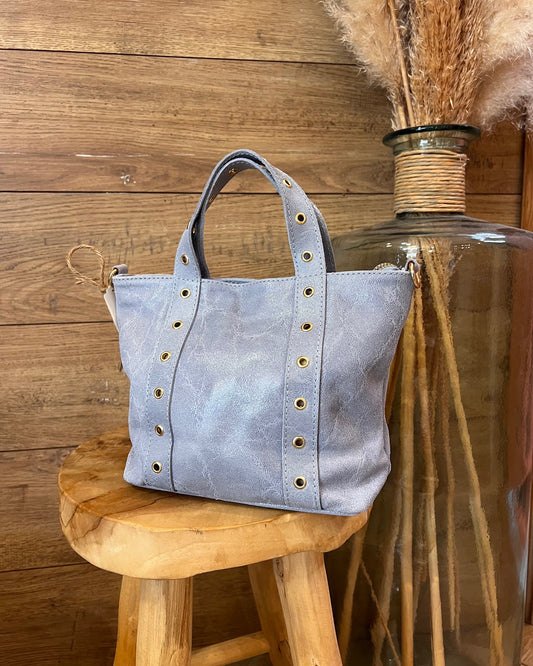 Sac en cuir vernis bleu avec œillets dorés – La Maison de Manon